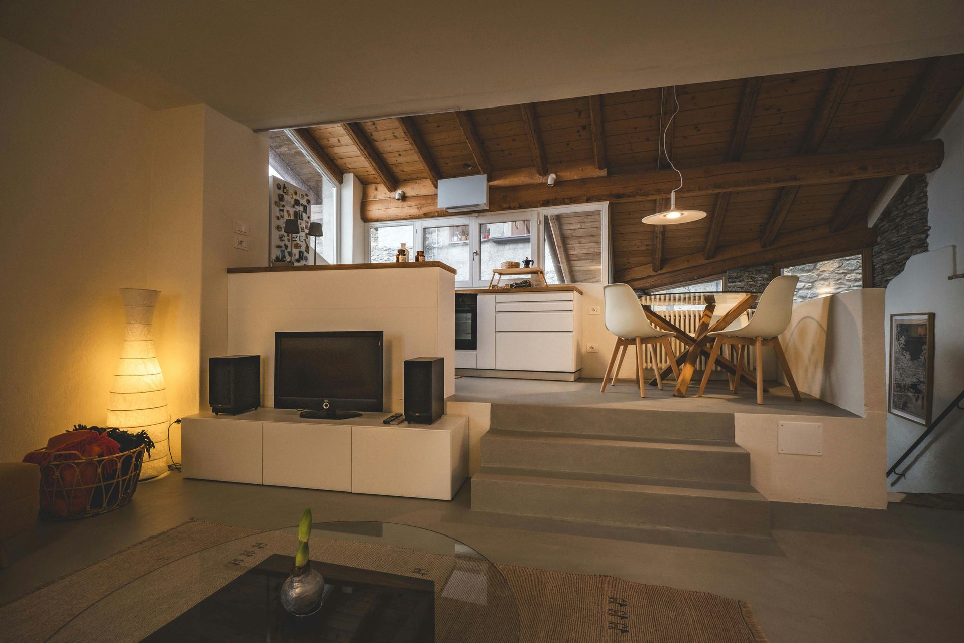 A living room filled with furniture and a flat screen TV